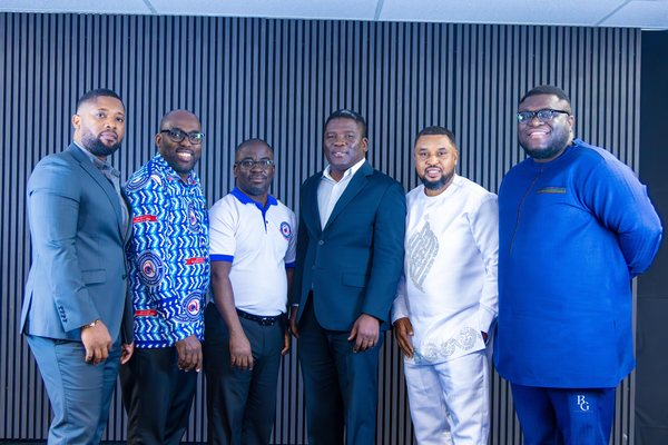 Men of the assembly standing together at a Men's Movement gathering.
